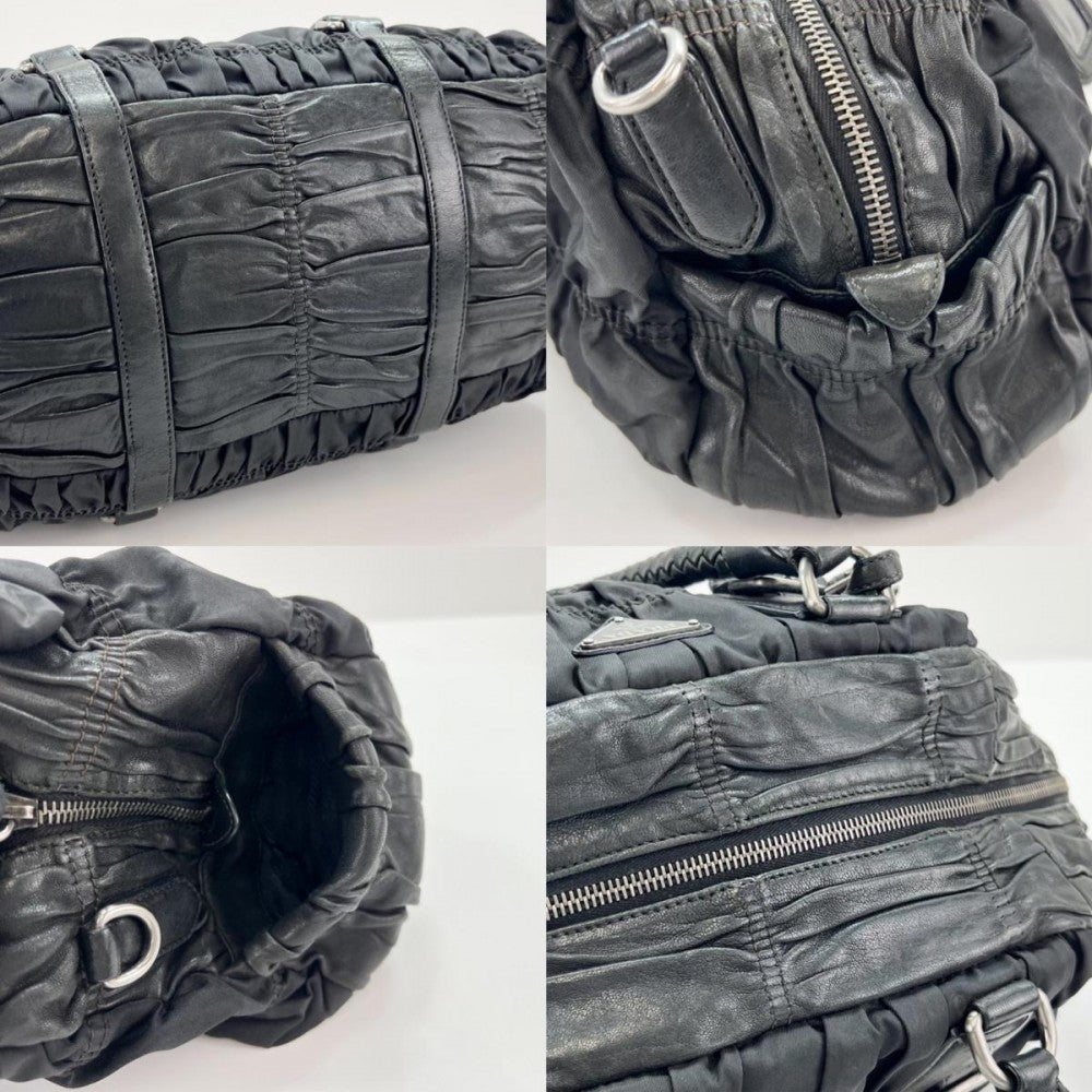 PRADA プラダ ハンドバッグ 三角プレート ロゴ 編み込みハンドル ギャザー レザー ブラック 黒 シルバー金具 レディース【中古品】