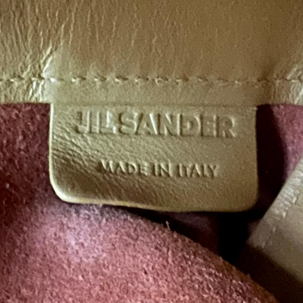 JIL SANDER ジルサンダー ショルダーバッグ ドローストリング ロゴ刻印 JSMU853338 レザー イエロー レディース【中古品】