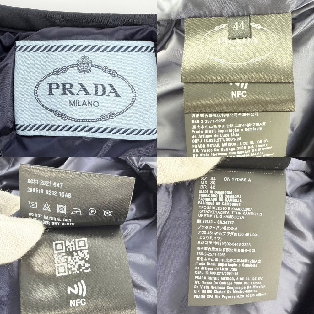 PRADA プラダ ブルゾン ノーカラーダウンジャケット アウター 服 トライアングルロゴ アパレル 44 ネイビー 紺 シルバー金具 春 秋 ポリアミド レディース【中古品】
