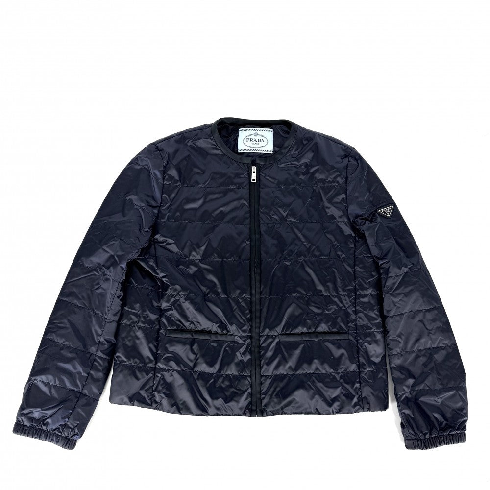 PRADA プラダ ブルゾン ノーカラーダウンジャケット アウター 服 トライアングルロゴ アパレル 44 ネイビー 紺 シルバー金具 春 秋 ポリアミド レディース【中古品】