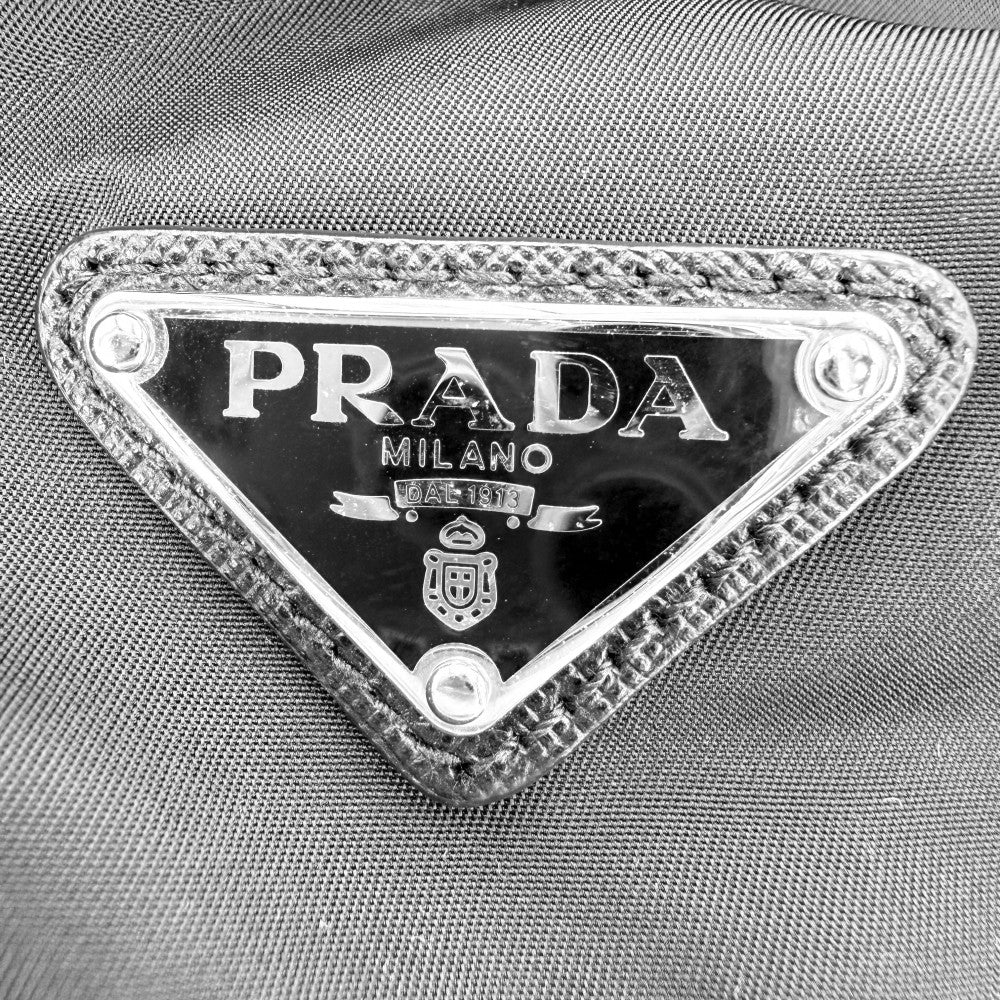 【開店SALE】 PRADA プラダ リュック トライアングルロゴ バックパック メンズ レディース 1BZ024 ナイロン ブラック 黒 シルバー金具 ユニセックス【中古品】