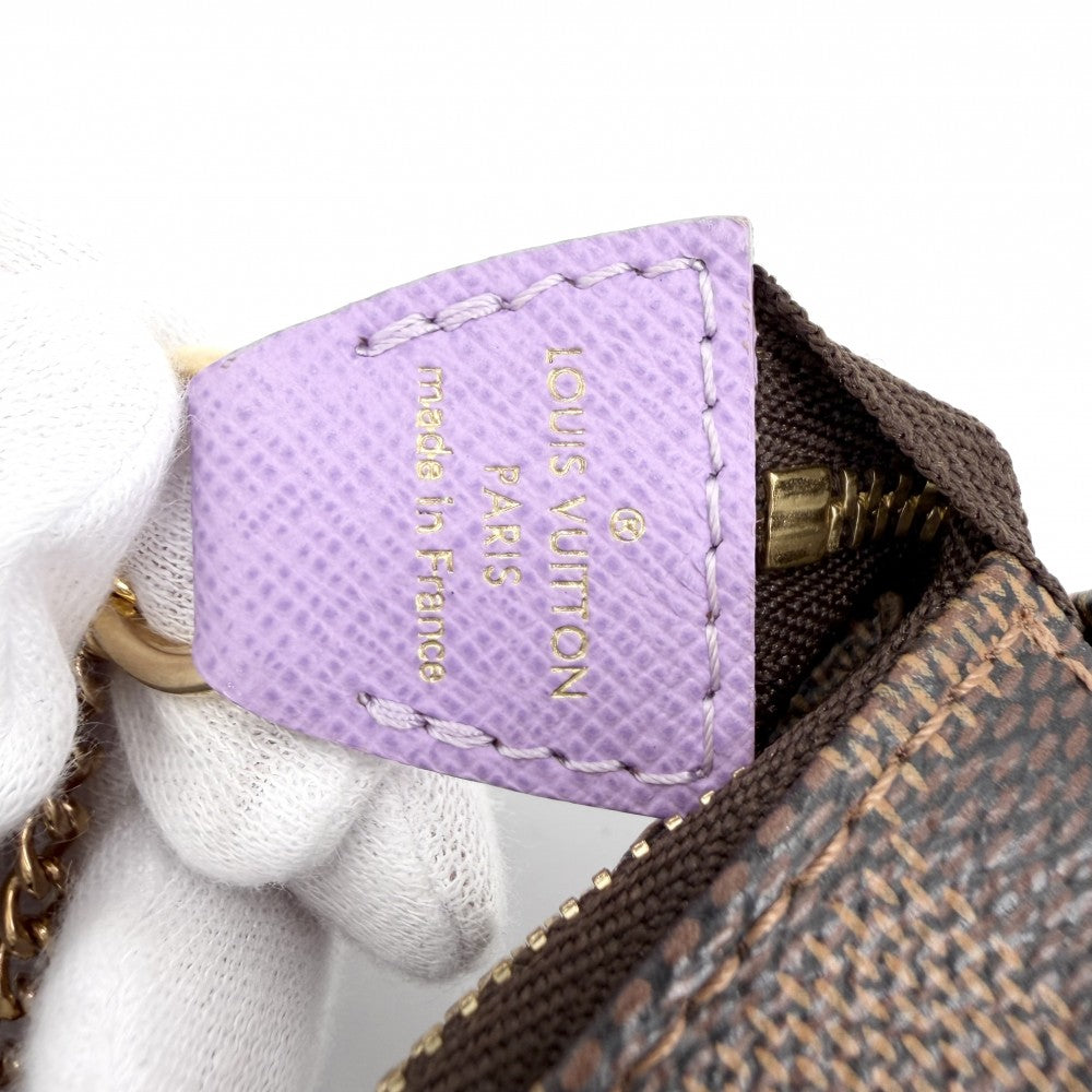 LOUIS VUITTON ルイヴィトン ハンドバッグ ダミエ ミニポシェットアクセソワール イリュストレ MiniPochette Accessoires アクセサリーポーチ N63003 モノグラムキャンバス ブラウン 茶 パープル 紫
 ゴールド金具 レディース【中古品】