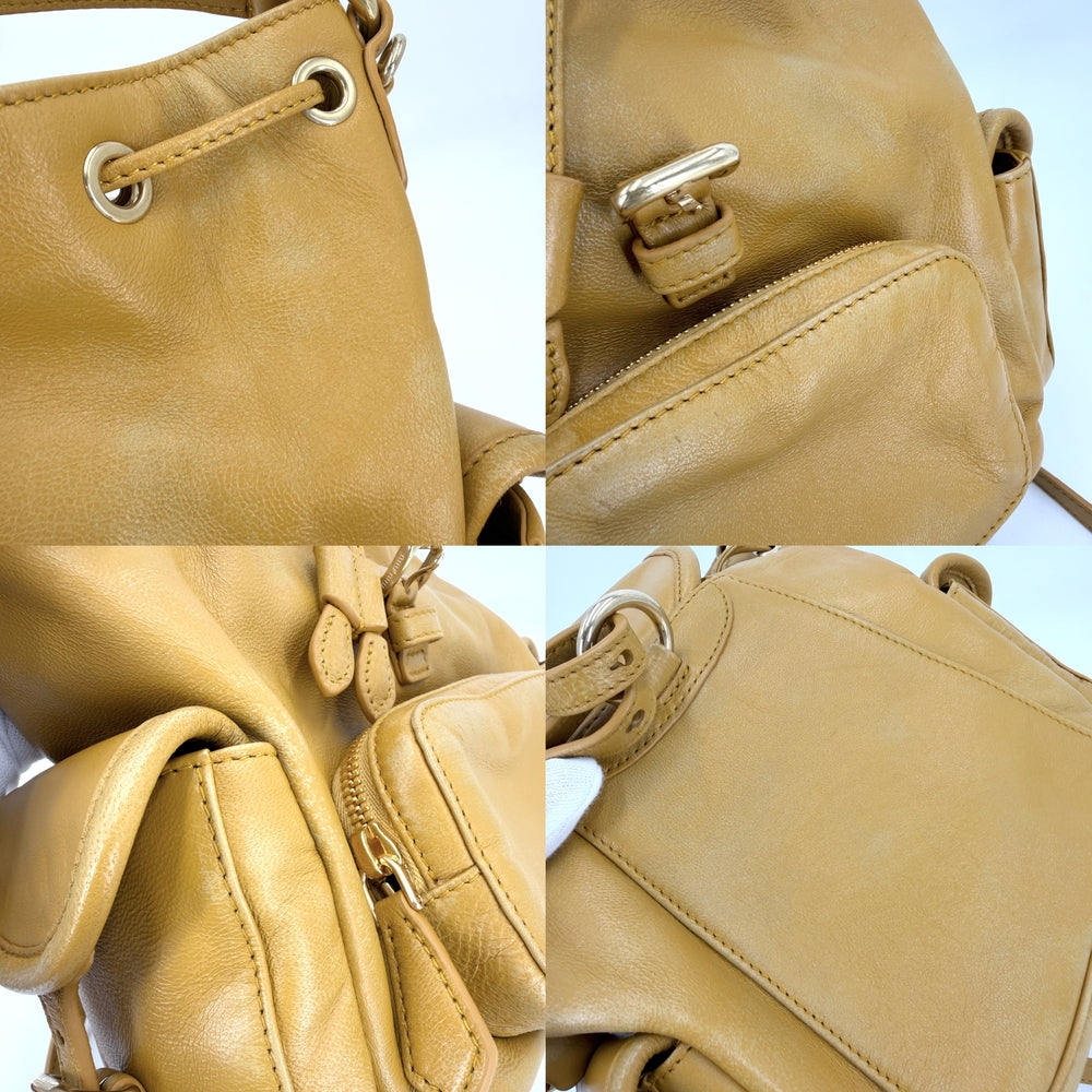 MIUMIU ミュウミュウ 2WAY バックパック リュックサック ハンドバッグ マスタード レザー イエロー ゴールド金具 レディース【中古品】