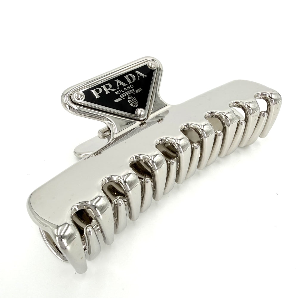 PRADA プラダ ヘアアクセサリー ヘアクリップ トライアングルロゴ トライアングルロゴ 小物 シルバー レディース【中古品】